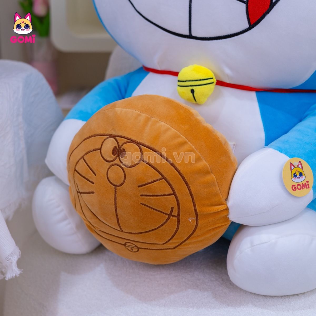 Gấu Bông Doraemon Ôm Bánh