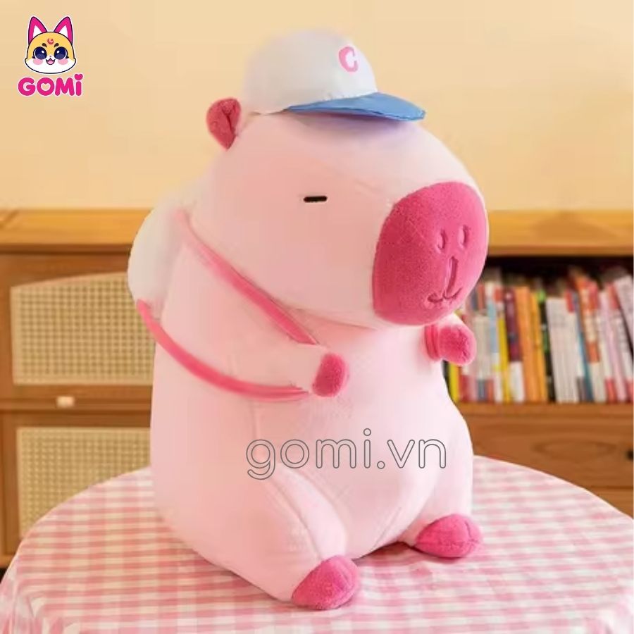 Gối Mền Capybara Đeo Balo Đội Nón
