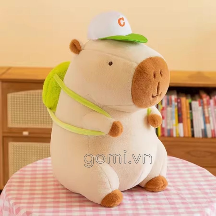 Gối Mền Capybara Đeo Balo Đội Nón