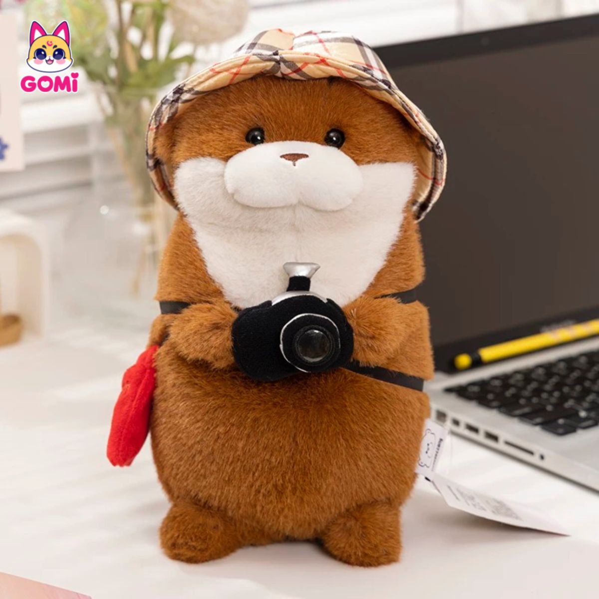 Gấu Bông Rái Cá Đeo Máy Ảnh