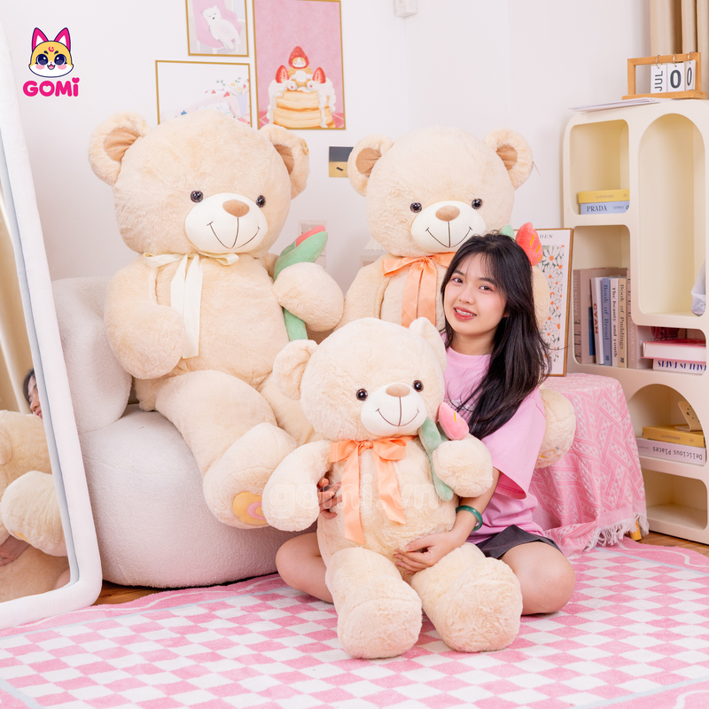 Gấu Bông Teddy Nơ Cầm Hoa