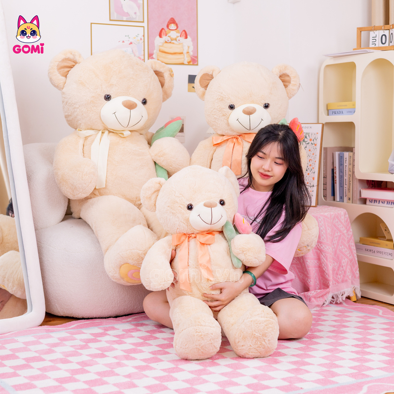 Gấu Bông Teddy Nơ Cầm Hoa