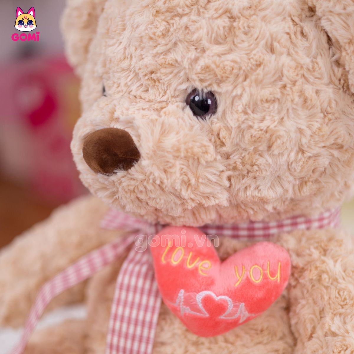 Gấu Bông Teddy Nơ Tim Rút