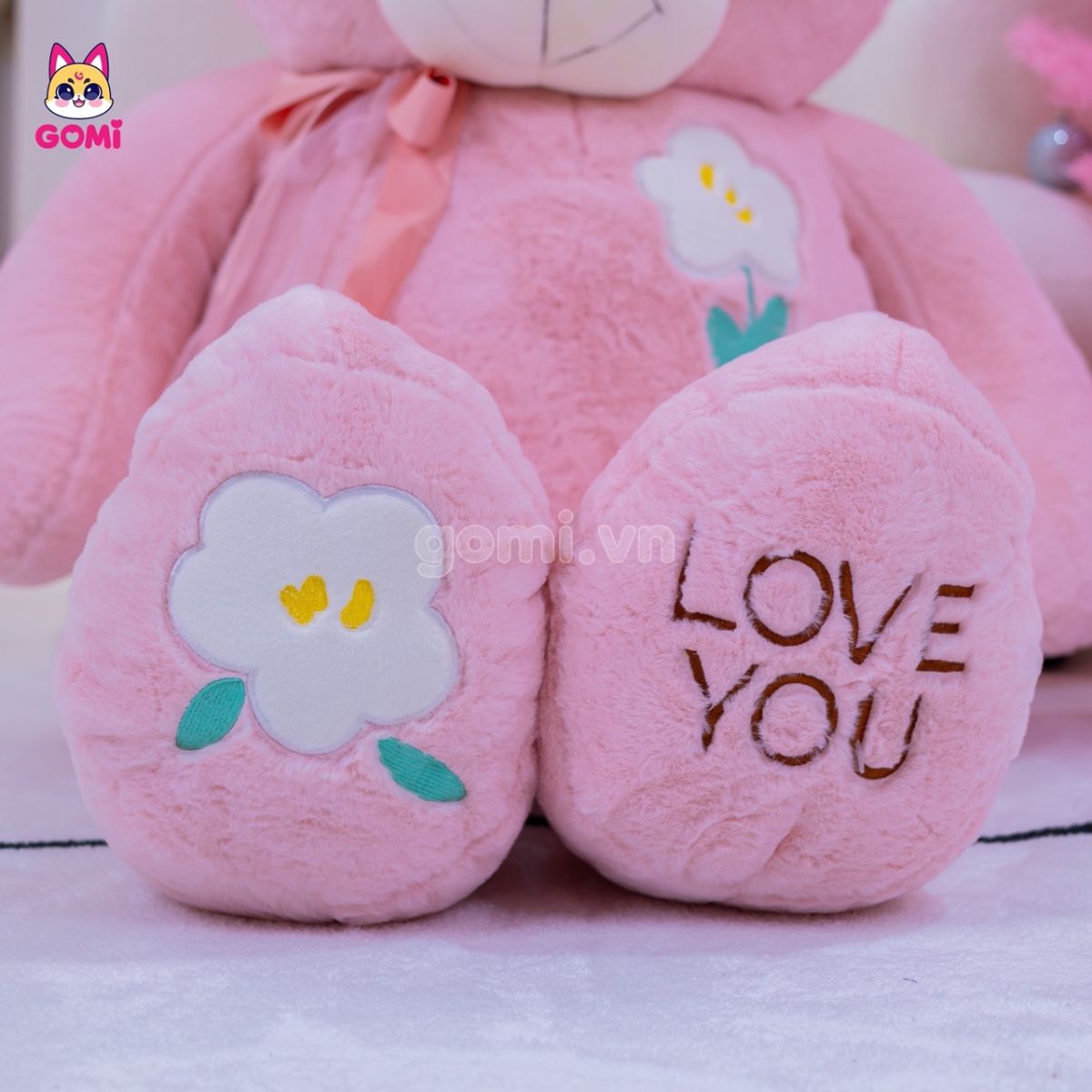 Gấu Bông Teddy Ngực Cành Hoa